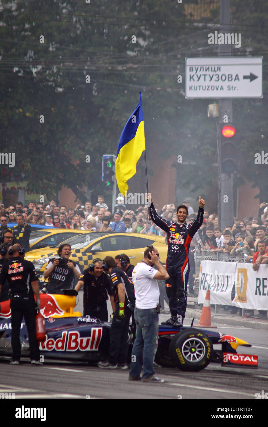 KYIV, UKRAINE - MAY 19, 2012: Driver Daniel Ricciardo of Red Bull Racing Team looks on during Red Bull Champions Parade on the s Stock Photo