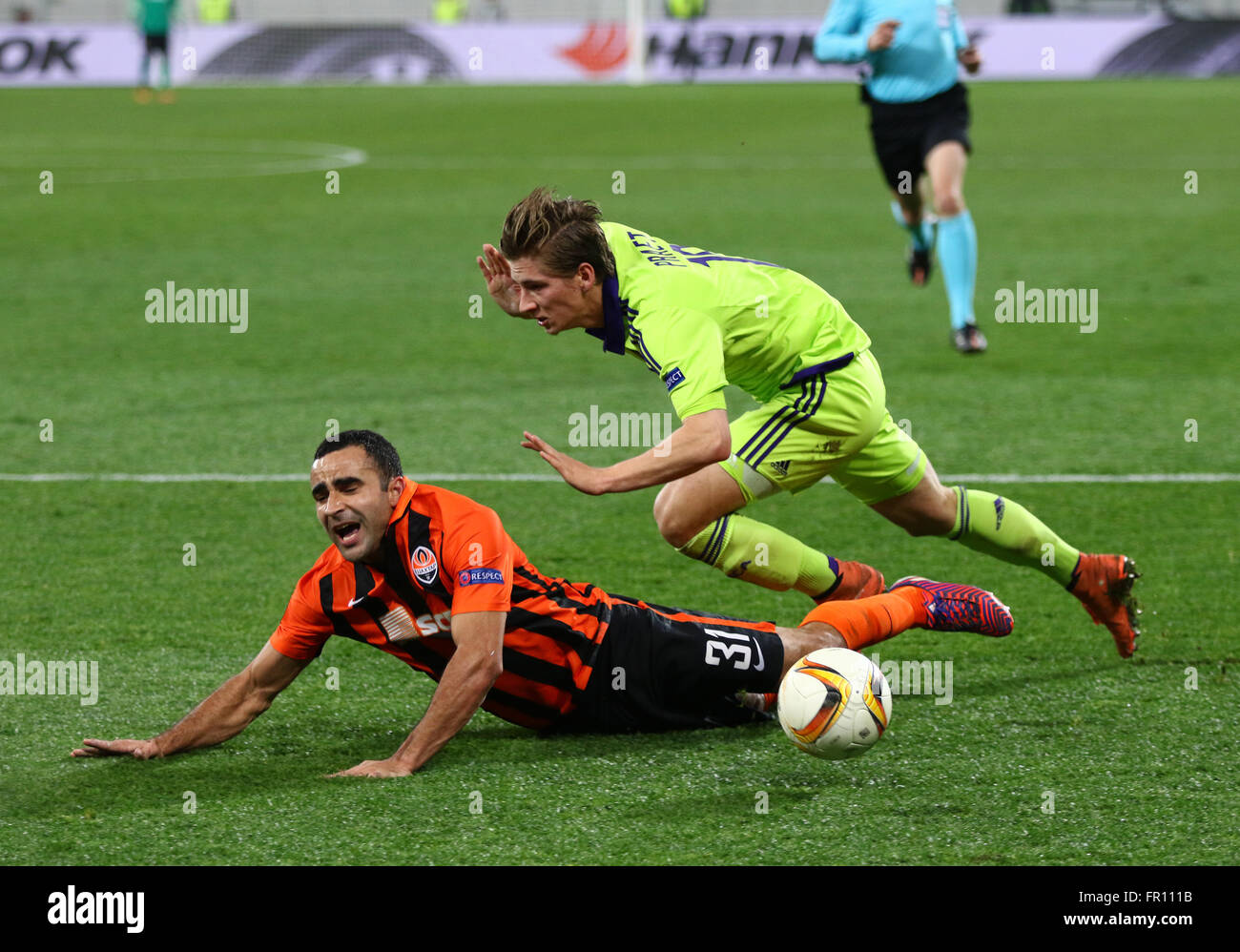 LVIV, UKRAINE - March 10, 2016: Ismaily of FC Shakhtar Donetsk (L) fights for a ball with Dennis Praet of RSC Anderlecht during  Stock Photo