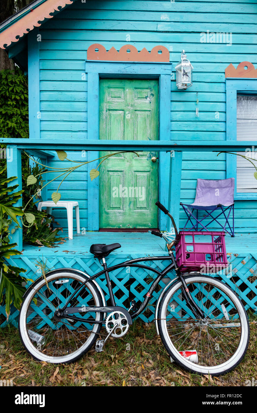 Florida St. Saint Pete Petersburg Beach,Gulfport,Beach Boulevard South,cottage,house home houses homes residence,bicycle,bicycling,riding,biking,rider Stock Photo