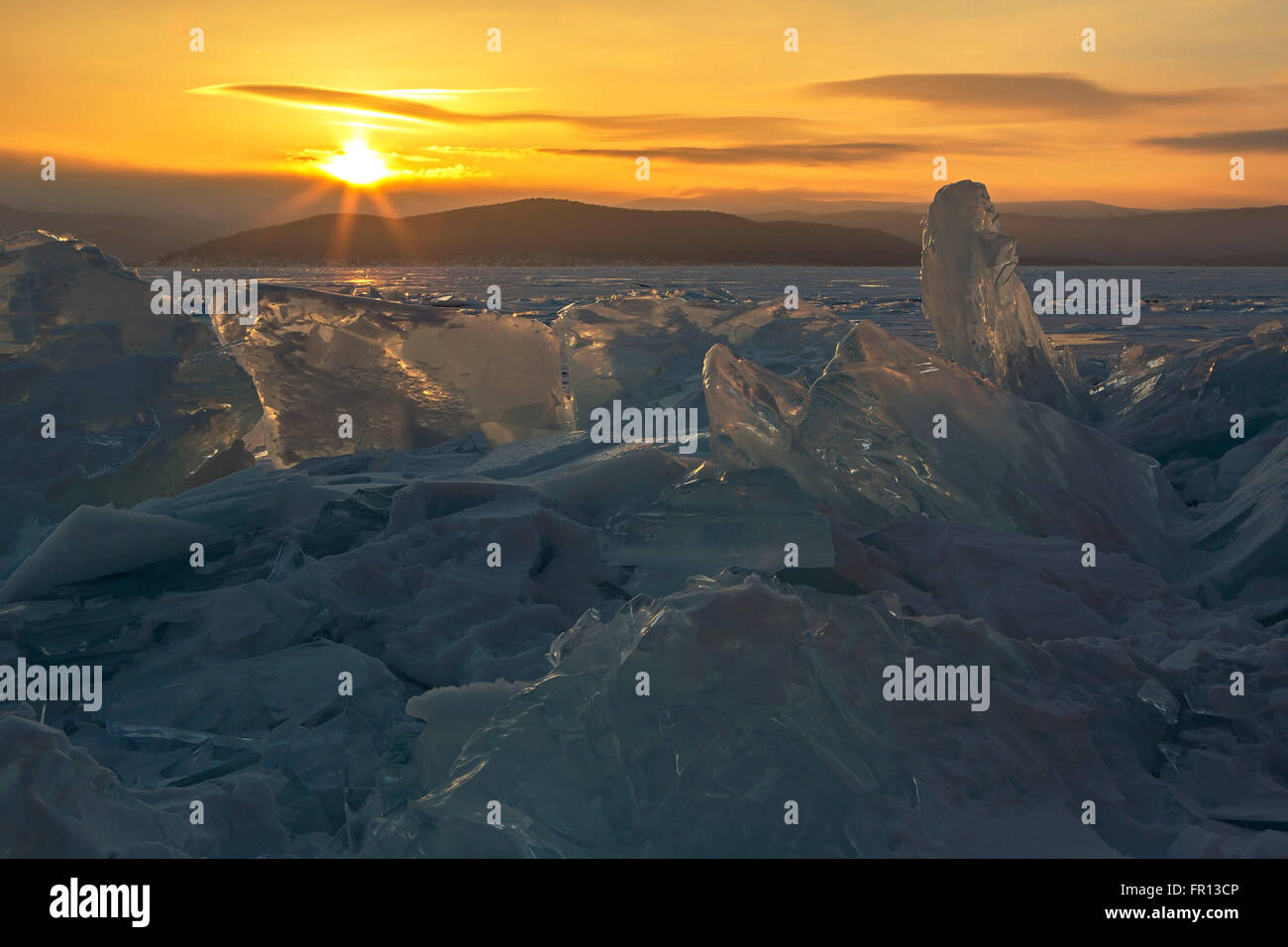 Sun Rising Ice Transparent pieces of ice and the rising sun Stock Photo - Alamy