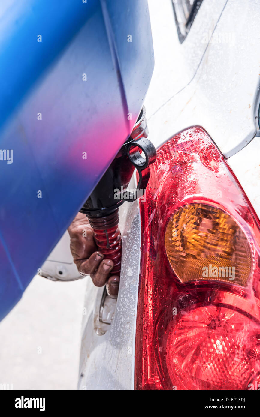 Emergency vehicle refueling, pouring fuel into gas tank from gas canister Stock Photo Alamy