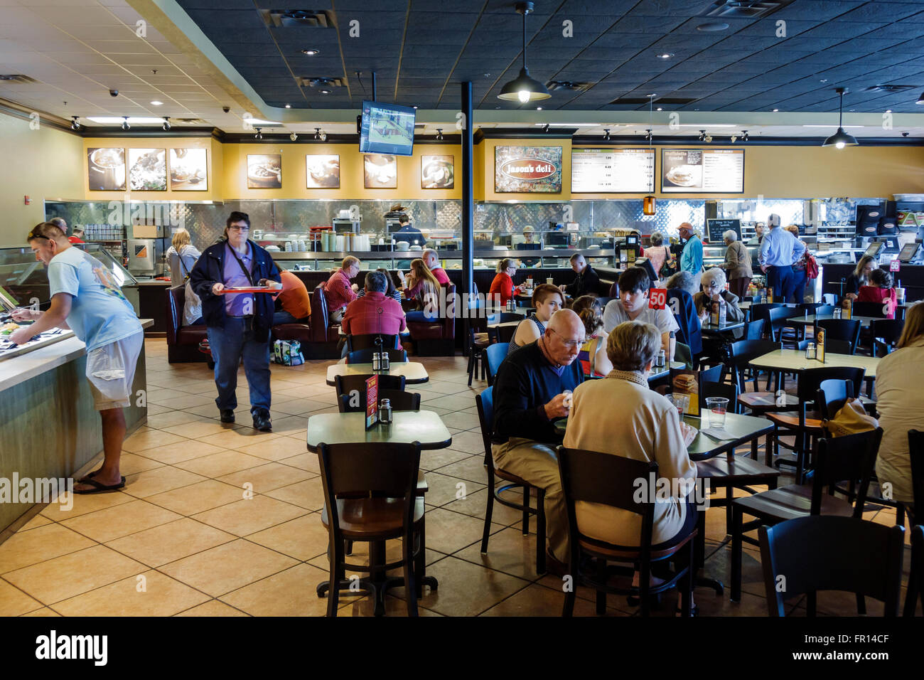 Florida,South,FL,Melbourne,Jason's Deli,restaurant restaurants food dining eating out cafe cafes bistro,interior inside,tables,busy,lunchtime,visitors Stock Photo