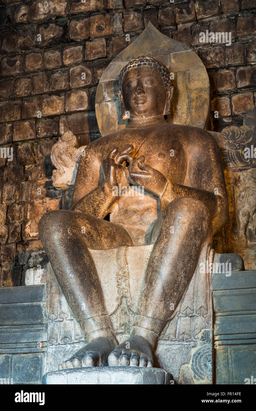 Buddha statue on a throne in Mendut Temple, Borobudur, Mageland, Jawa Tengah, Indonesia Stock Photo