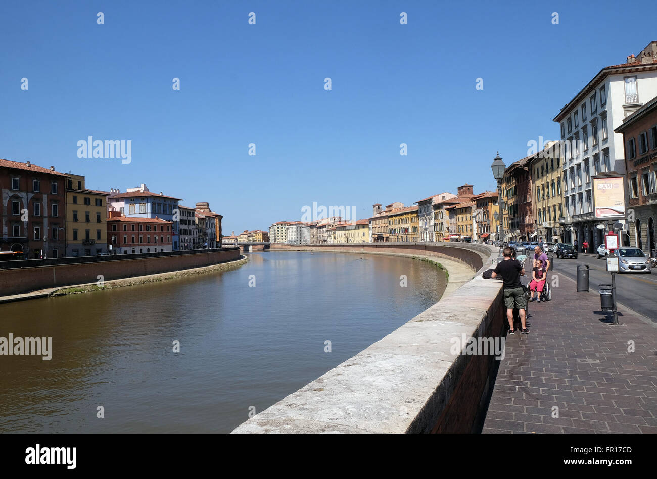 River Arno floating through the medieval city of Pisa in Italy, on June 06, 2015 Stock Photo