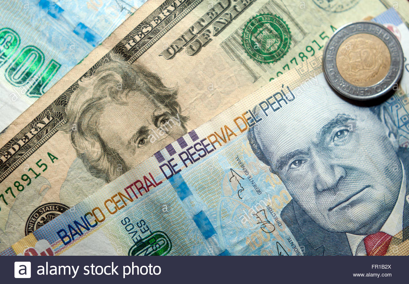 Peruvian Soles Peru Sol And US Dollars Currency Stock Photo peruvian-soles-peru-sol-and-us-dollars-currency-stock-photo