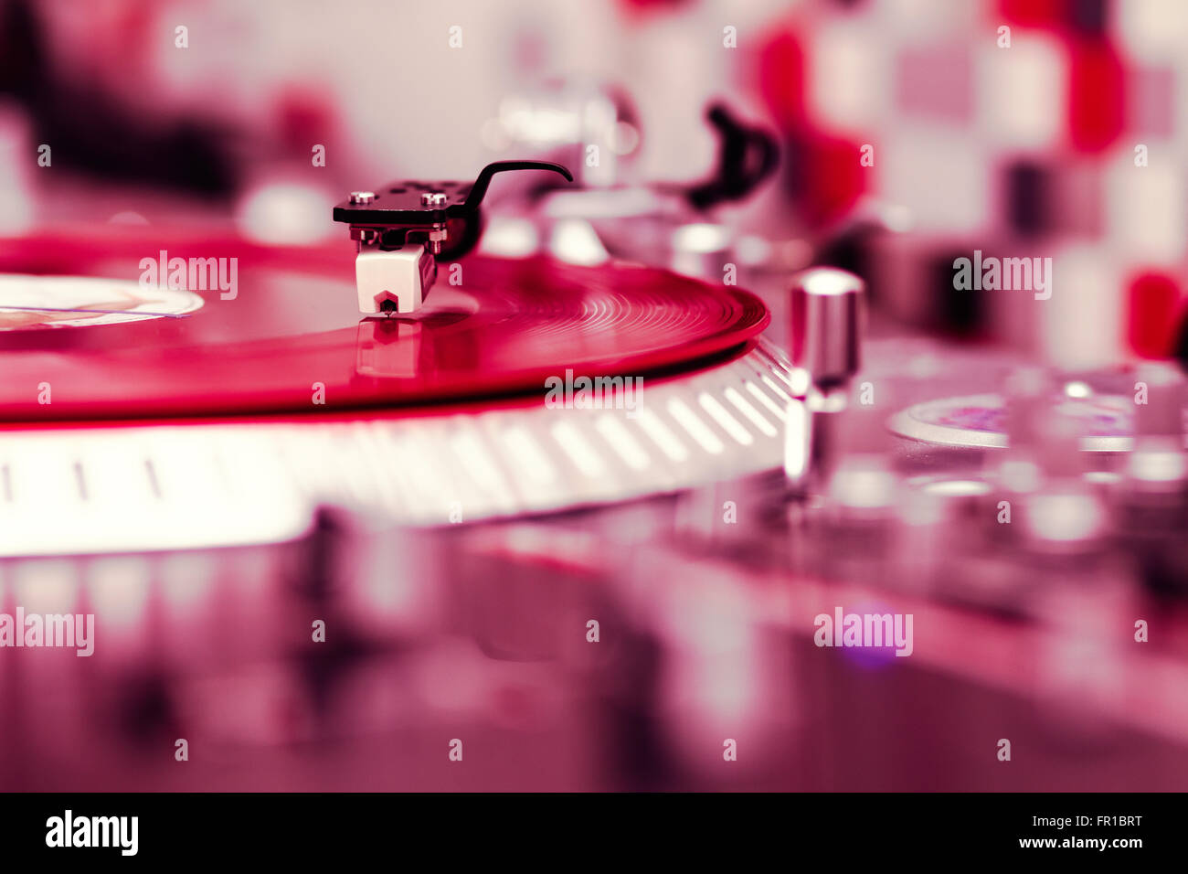 Professional turntable playing record with music Stock Photo