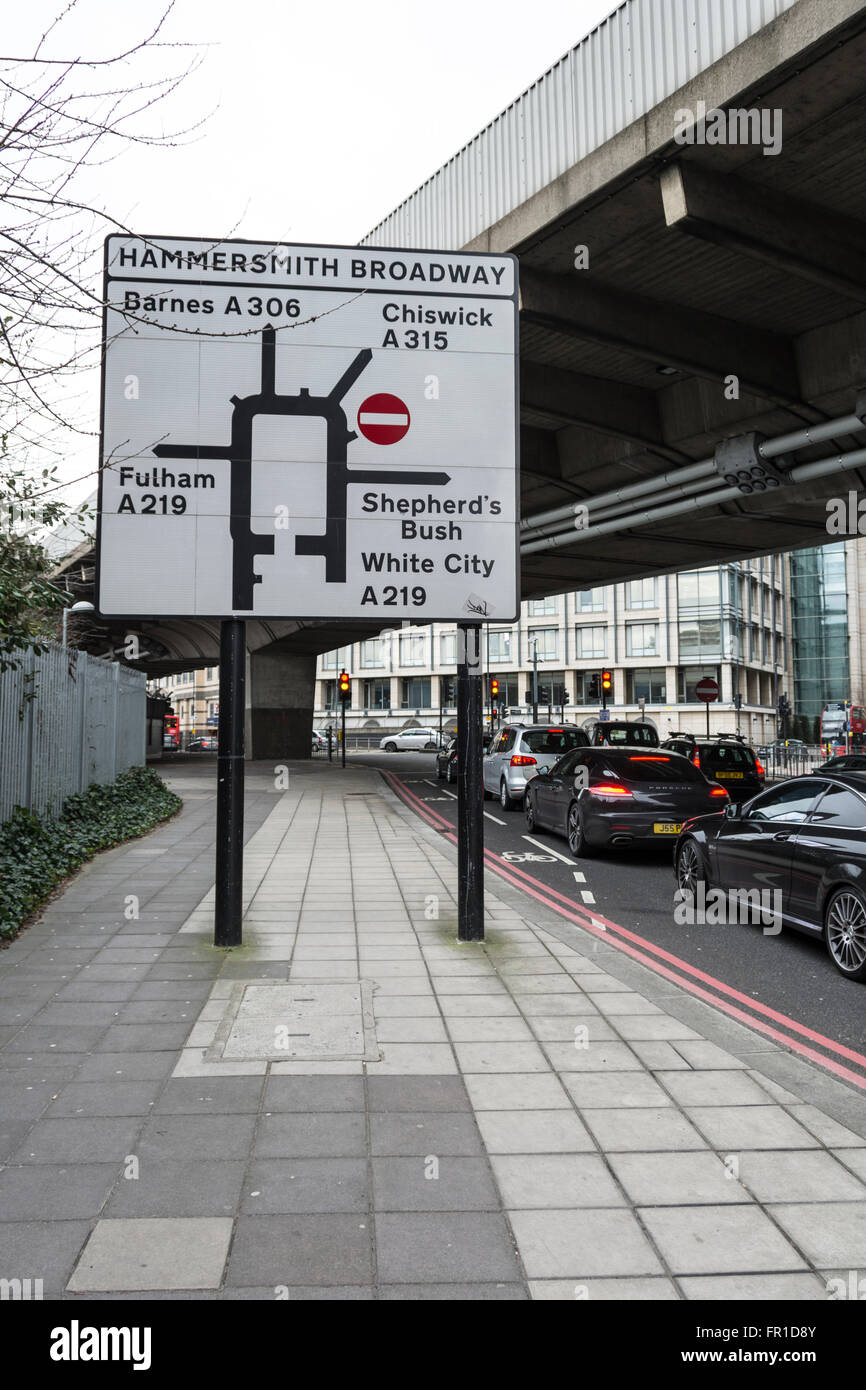 Confusing road sign underneath Hammersmith Flyover in west London, UK Stock Photo