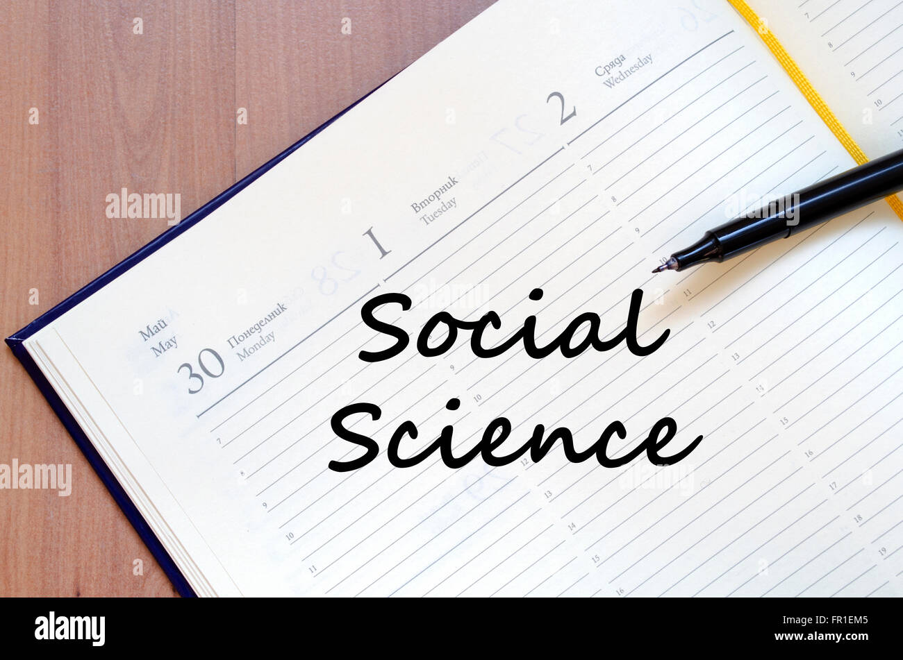 Social science text concept write on notebook with pen Stock Photo