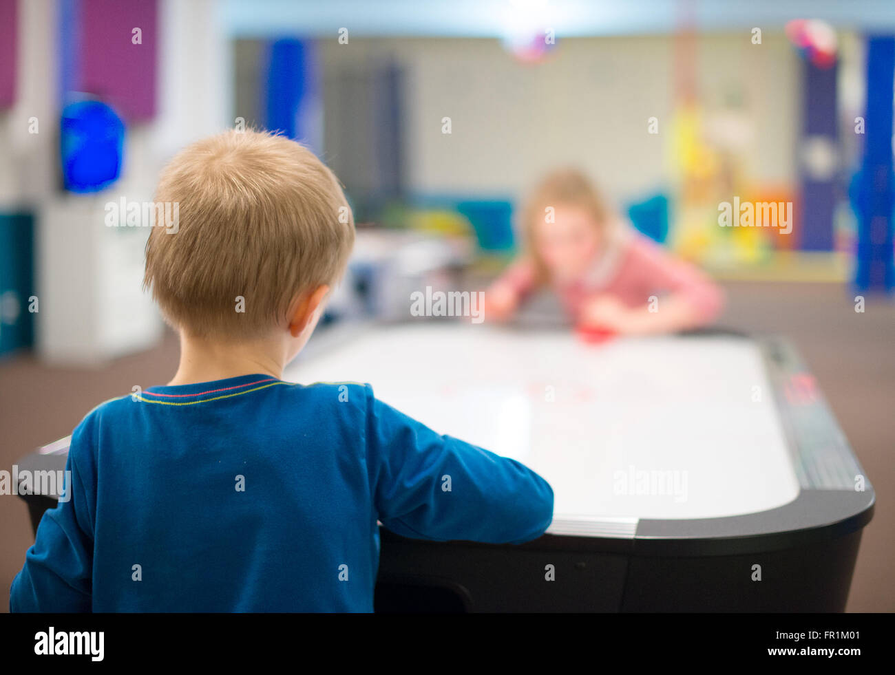 Children playing ice hockey table board game Stock Photo Alamy