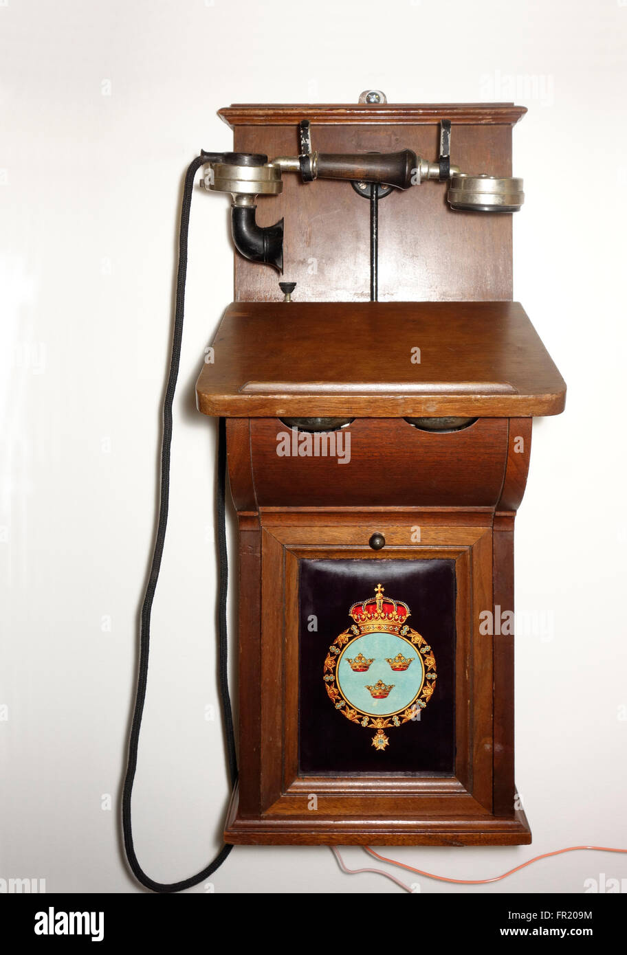 Vintage Mid-Century Swedish made wall Telephone with Dual Handle Crank Stock Photo