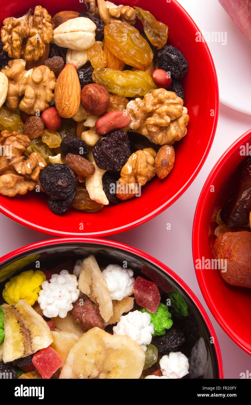various mix dried fruits and nuts on the white background Stock Photo