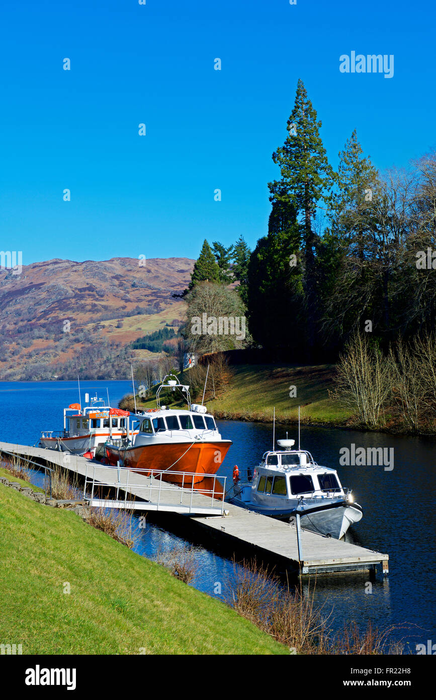 Boats moored on Loch Ness at Fort Augustus, Scottish Highlands, UK