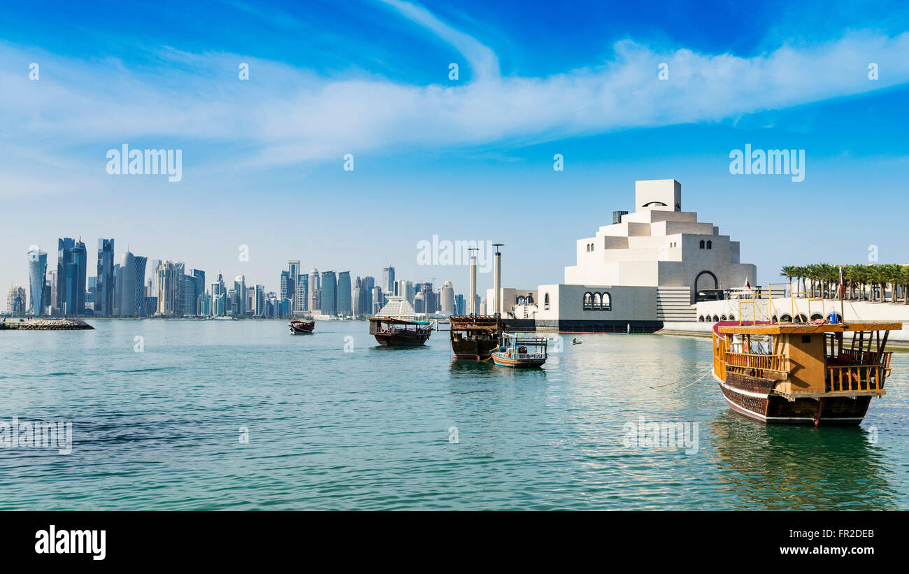 View of Museum of Islamic Art and skyline of city in Doha Qatar Stock Photo