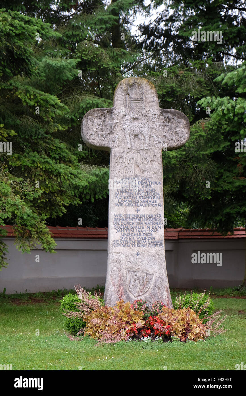 Cross, cemetery in Ursberg, Germany on June 09, 2015 Stock Photo
