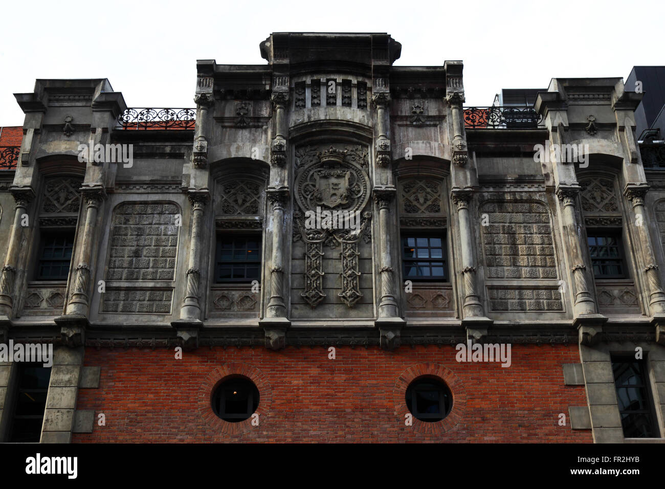 Side wall of the Alhondiga building with Bilbao coat of arms, Bilbao, Basque Country, Spain Stock Photo