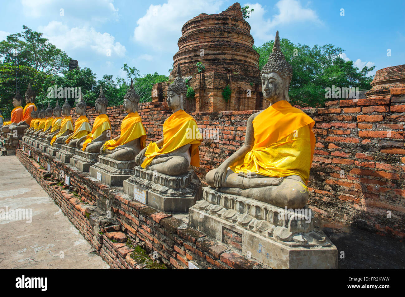 Buddha statues around the central stupa, Wat Yai Chai Mongkhon, Ayutthaya, Thailand, Unesco World Heritage Site Stock Photo