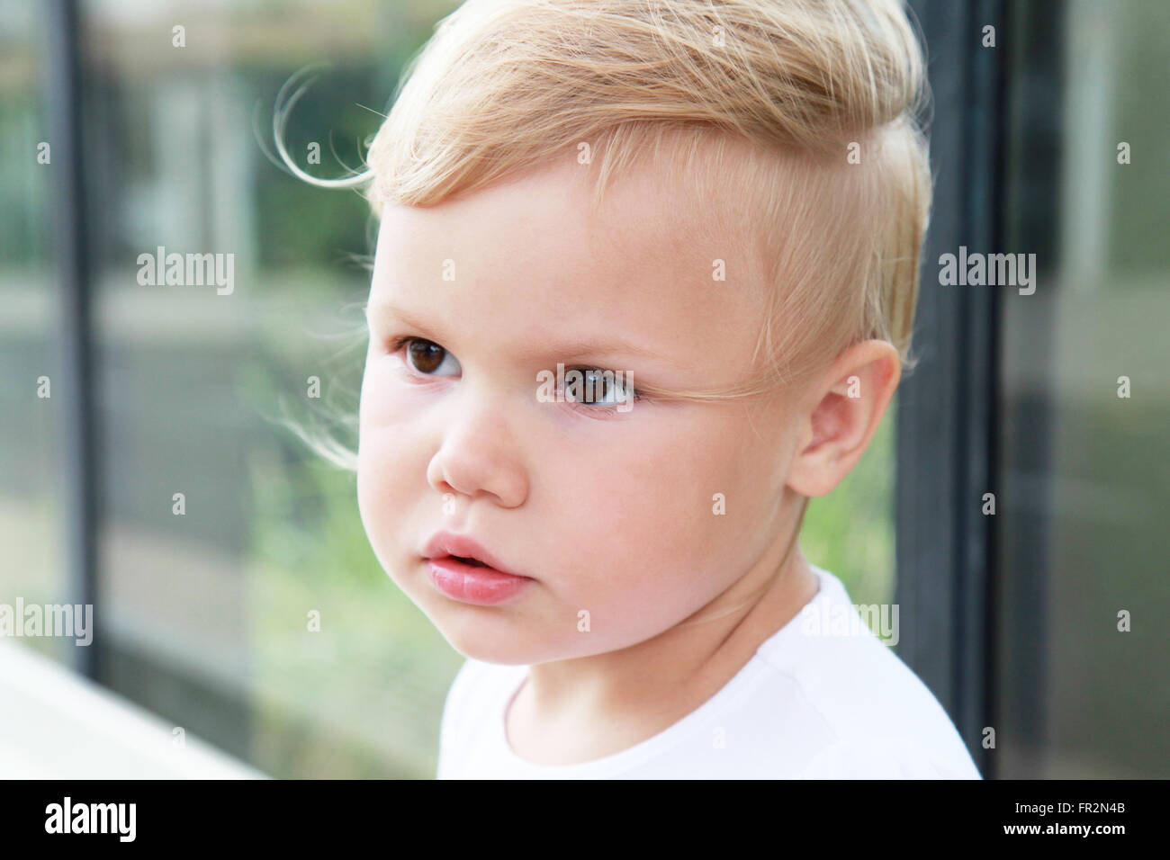 Outdoor close-up portrait of cute Caucasian blond baby girl Stock Photo ...