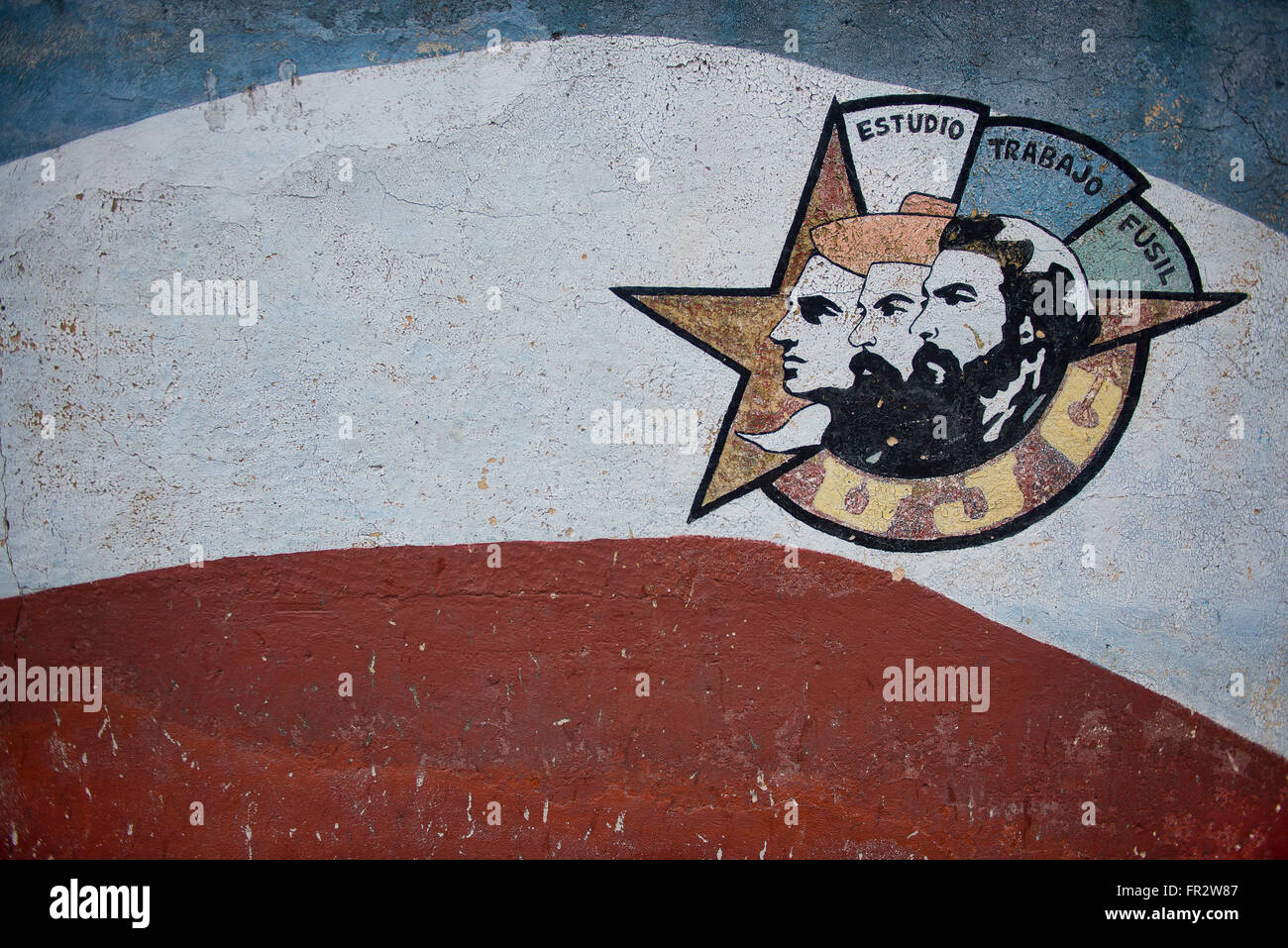 A mural to the Young Communist League (Unión de Jóvenes Comunistas, UJC) painted on a wall in Havana, Cuba. The words Estudio, T Stock Photo