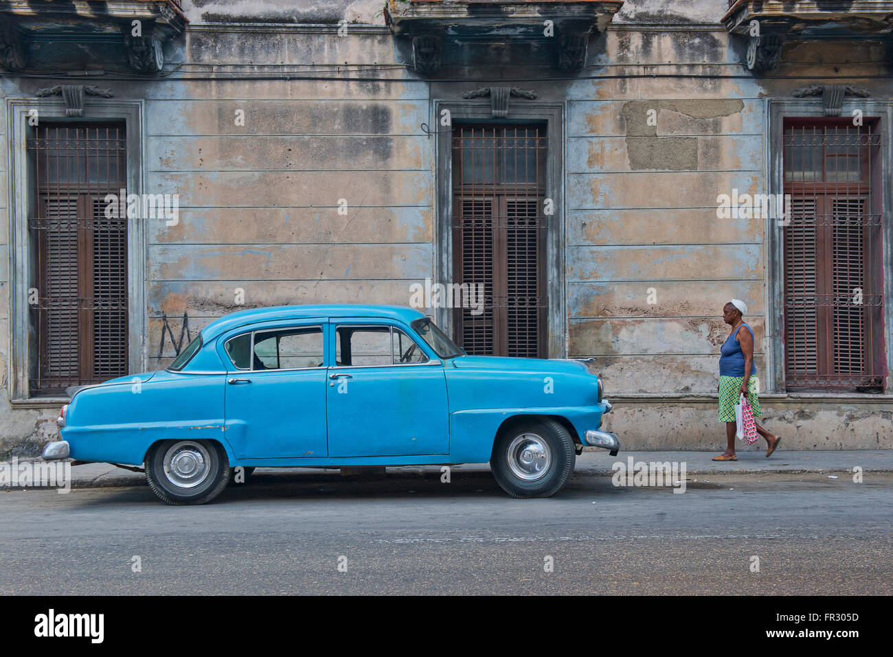 A vintage blue car parked on the streets of Old Havana, Cuba. Stock Photo