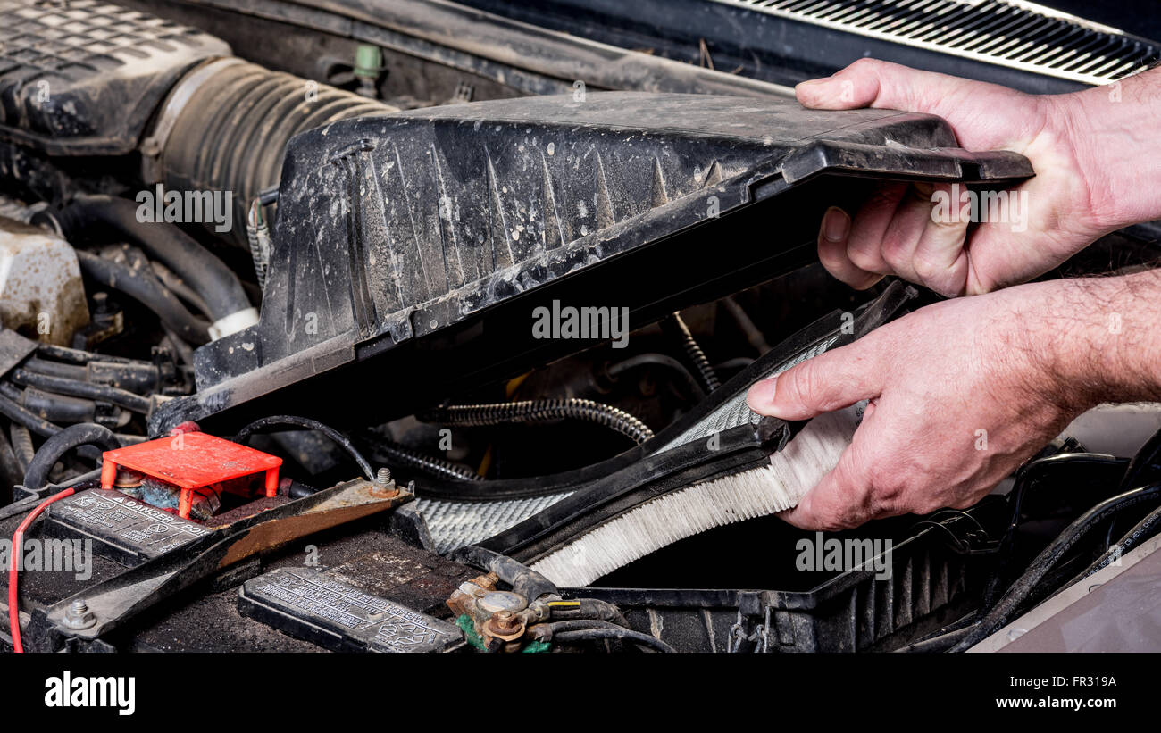 New air filter installation in automobile Stock Photo Alamy