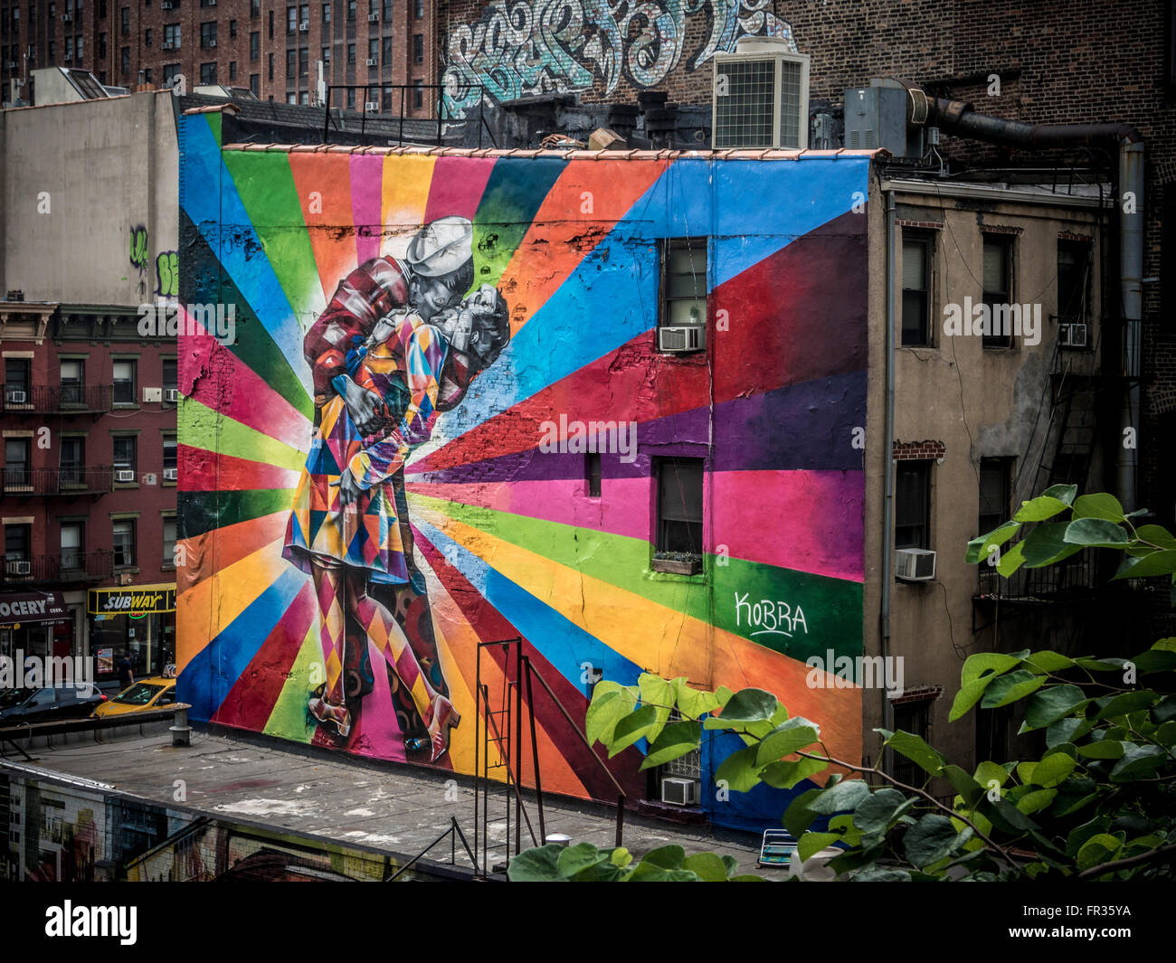 'The Kiss' by Eduardo Kobra. Graffiti seen from The High Line, New York City, USA. Stock Photo