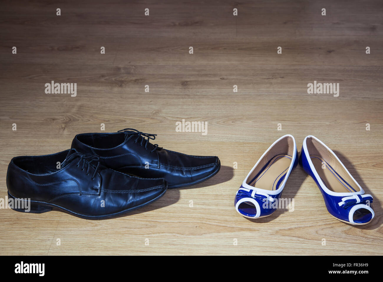 women's shoes turning away men's shoes closeup Stock Photo Alamy