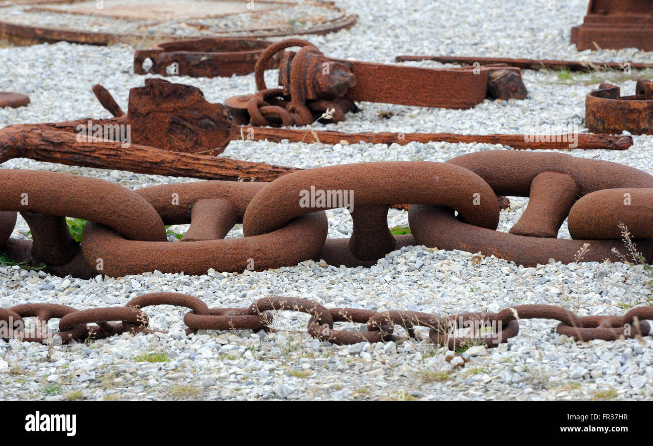 Rusty chains displayed outside the Falkland Islands Museum in the old dockyard at Stanley.  Stanley, Falkland Islands. Stock Photo