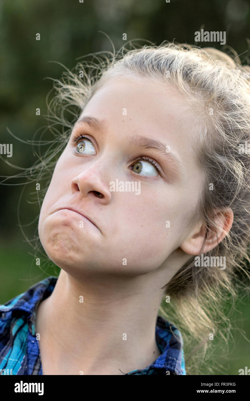 a young girl making funny faces Stock Photo