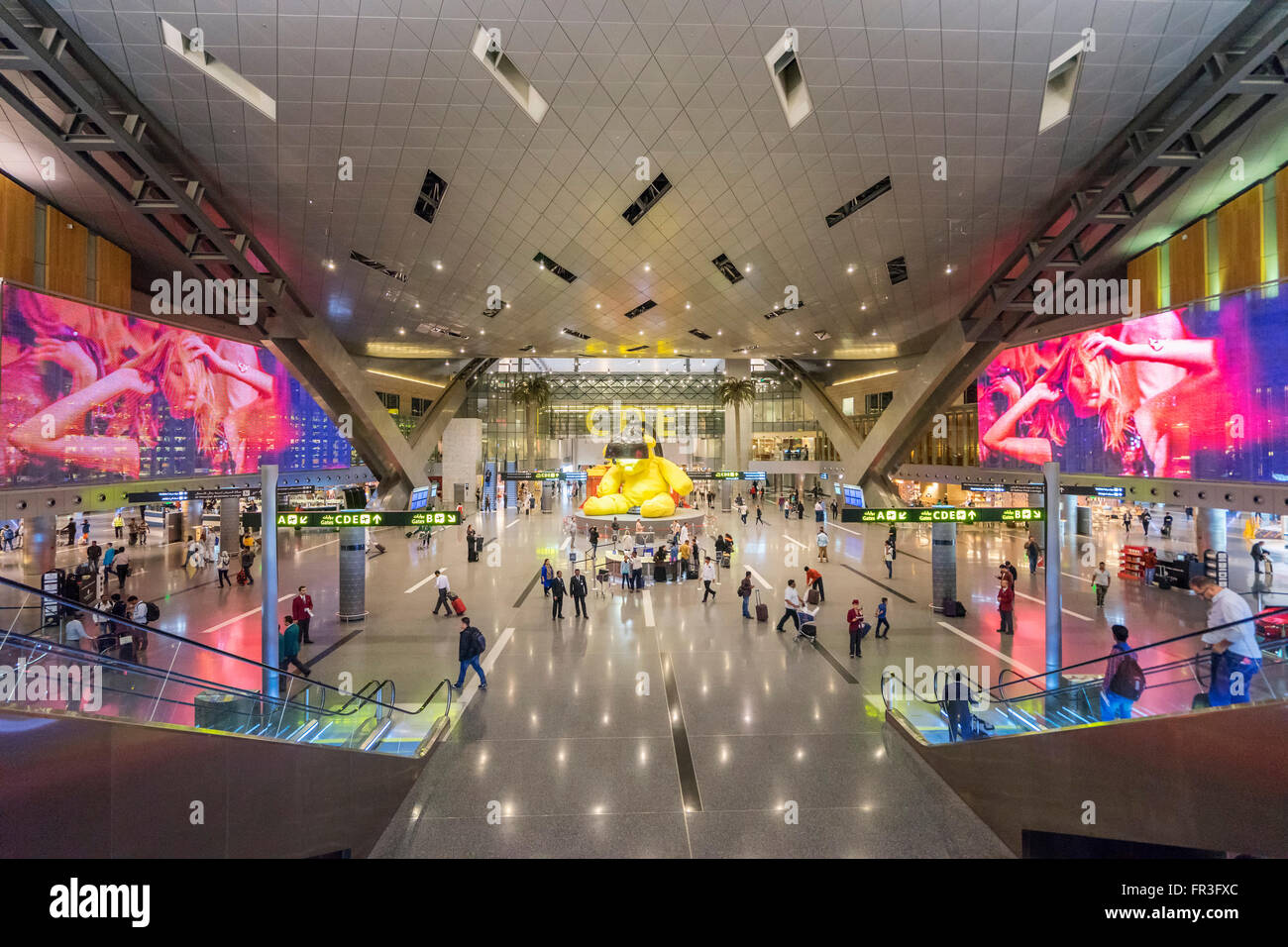 Interior of modern passenger terminal building at new Hamad International Airport in Doha Qatar Stock Photo