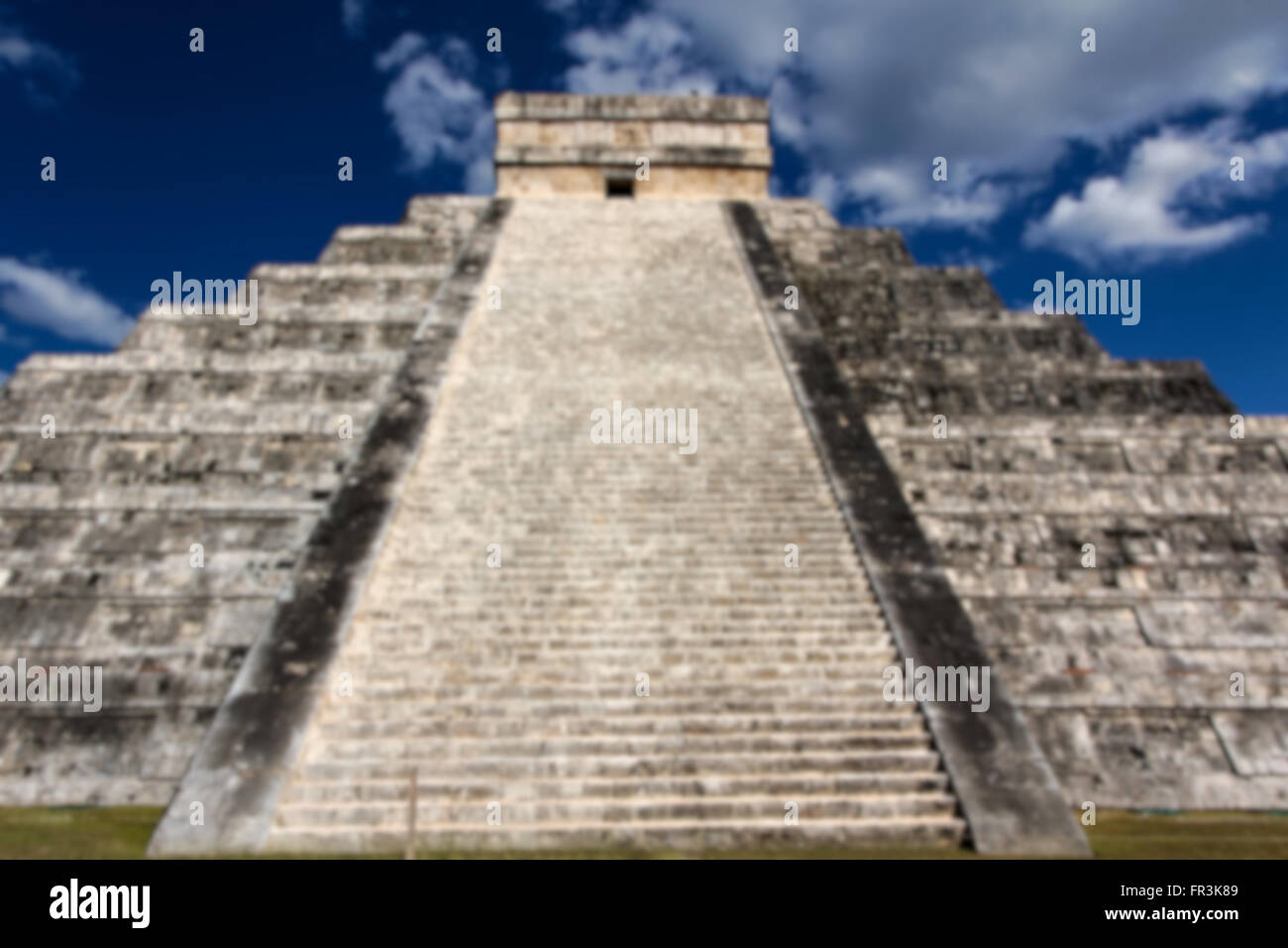 Blurred background of View up the stairs of Kukulkan Pyramid at Chichen Itza, Yucatan, Mexico. Stock Photo