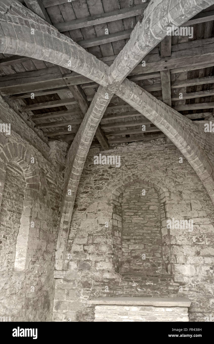 Roof supporting arches inside the Chapel of St. Thomas, Ludlow, Shropshire, England, UK. 12th century. Stock Photo