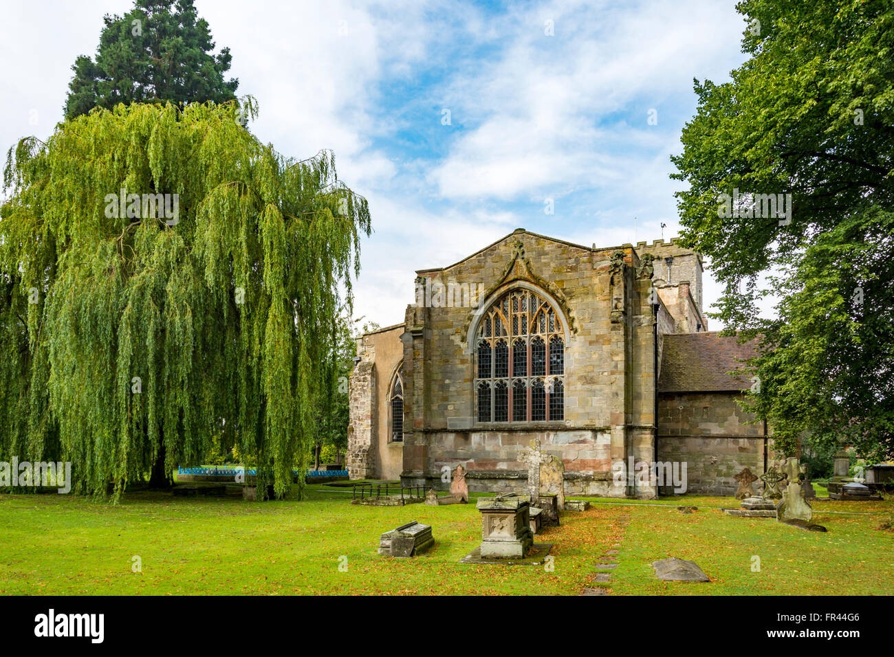 Holy Trinity Church (12th century) from the Church Green, Much Wenlock, Shropshire, England, UK