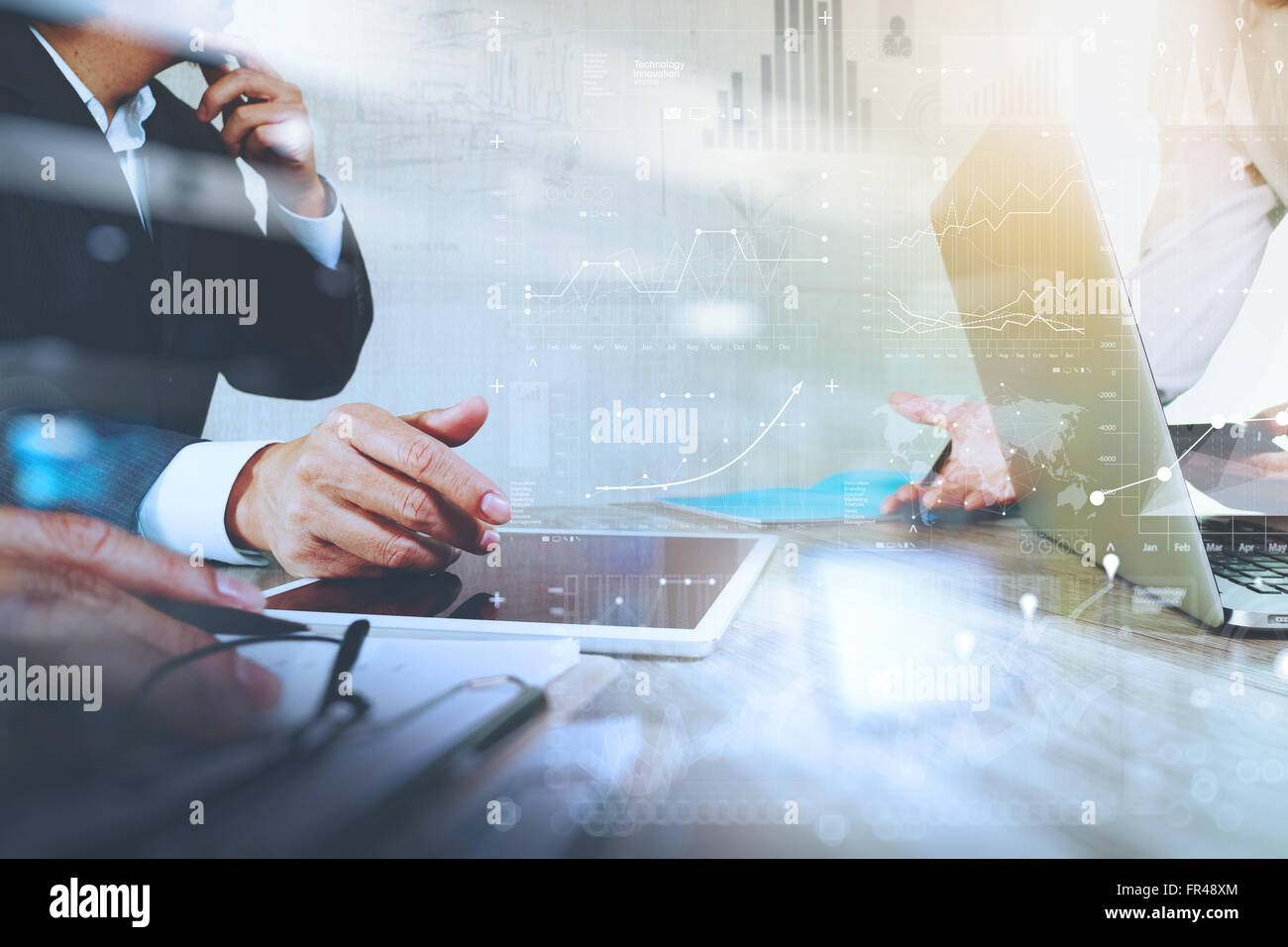 Businessman making presentation with his colleagues and business ...