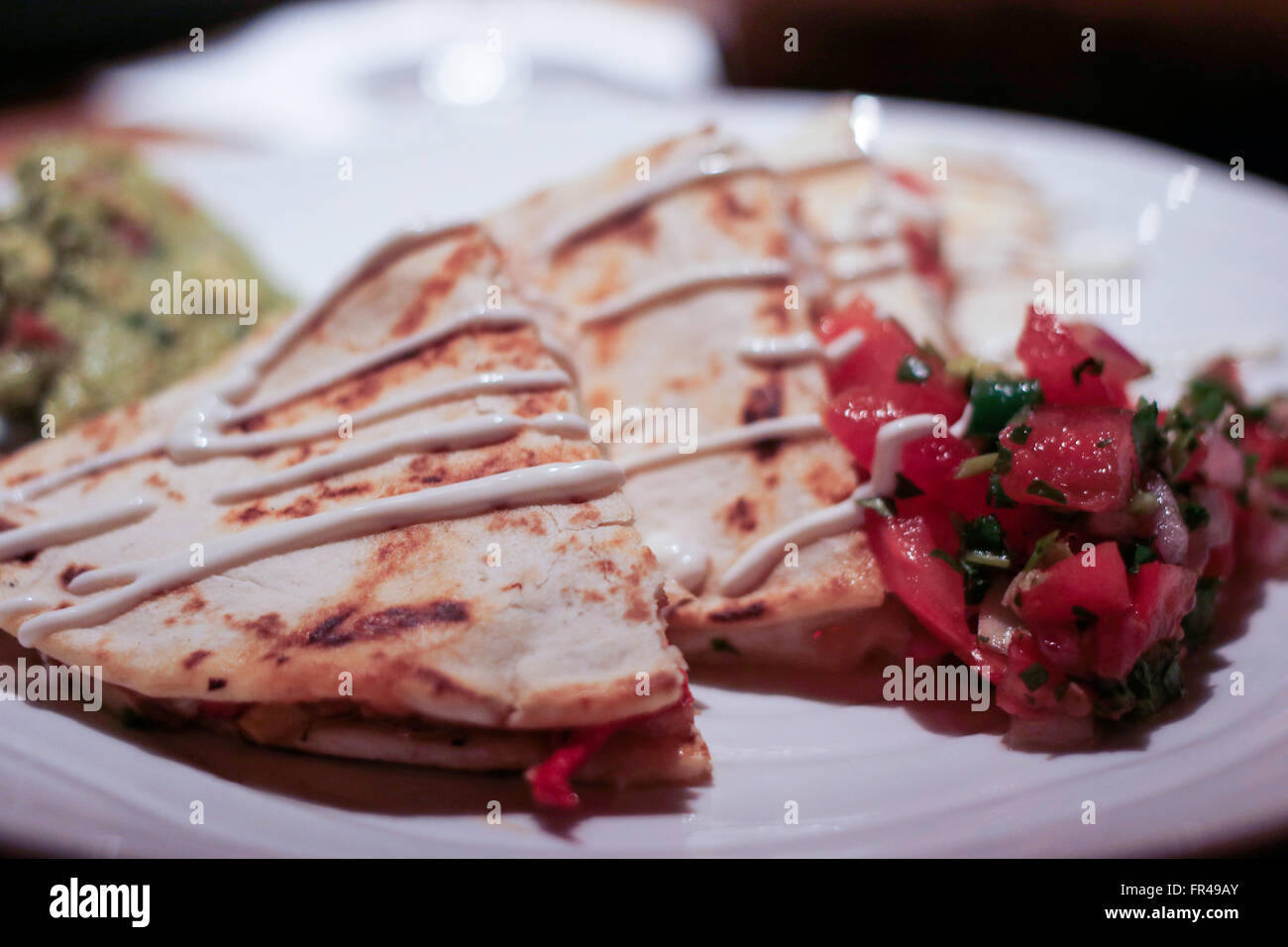 Food: Lobster quesadilla  with guacamole and salsa Stock Photo