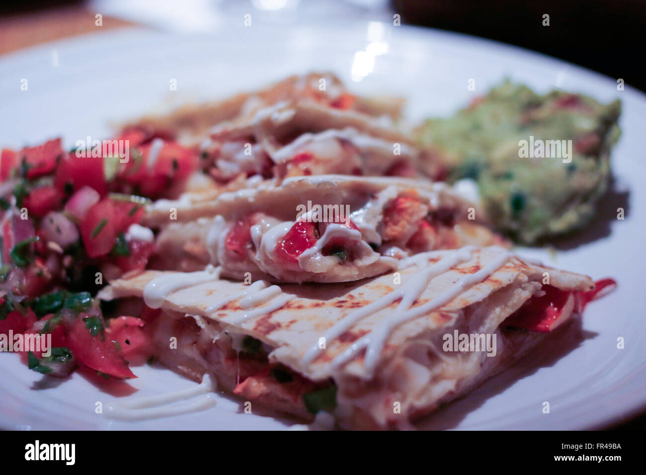 Food Lobster quesadilla with guacamole and salsa Stock Photo Alamy