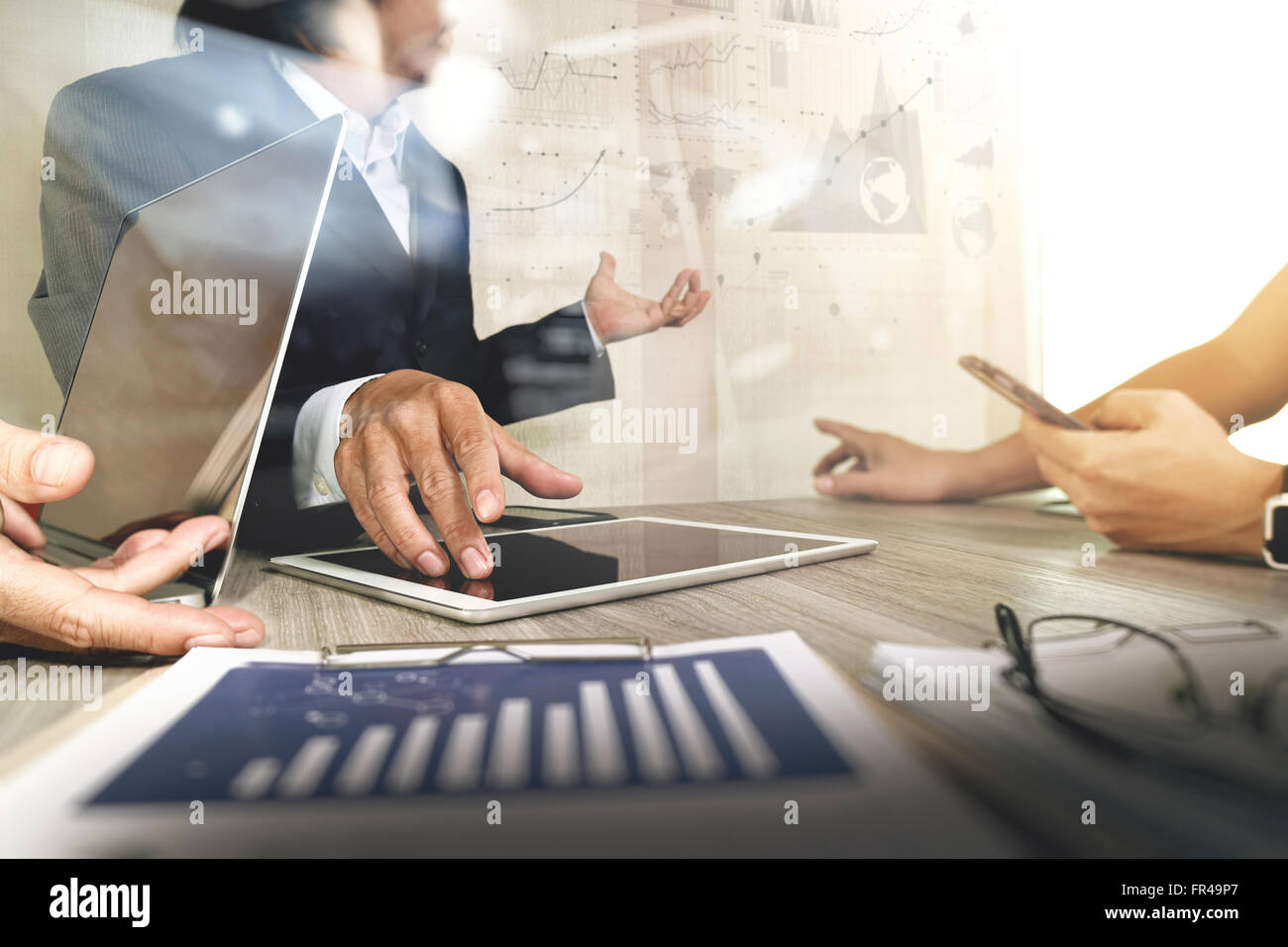 Businessman making presentation with his colleagues and business ...