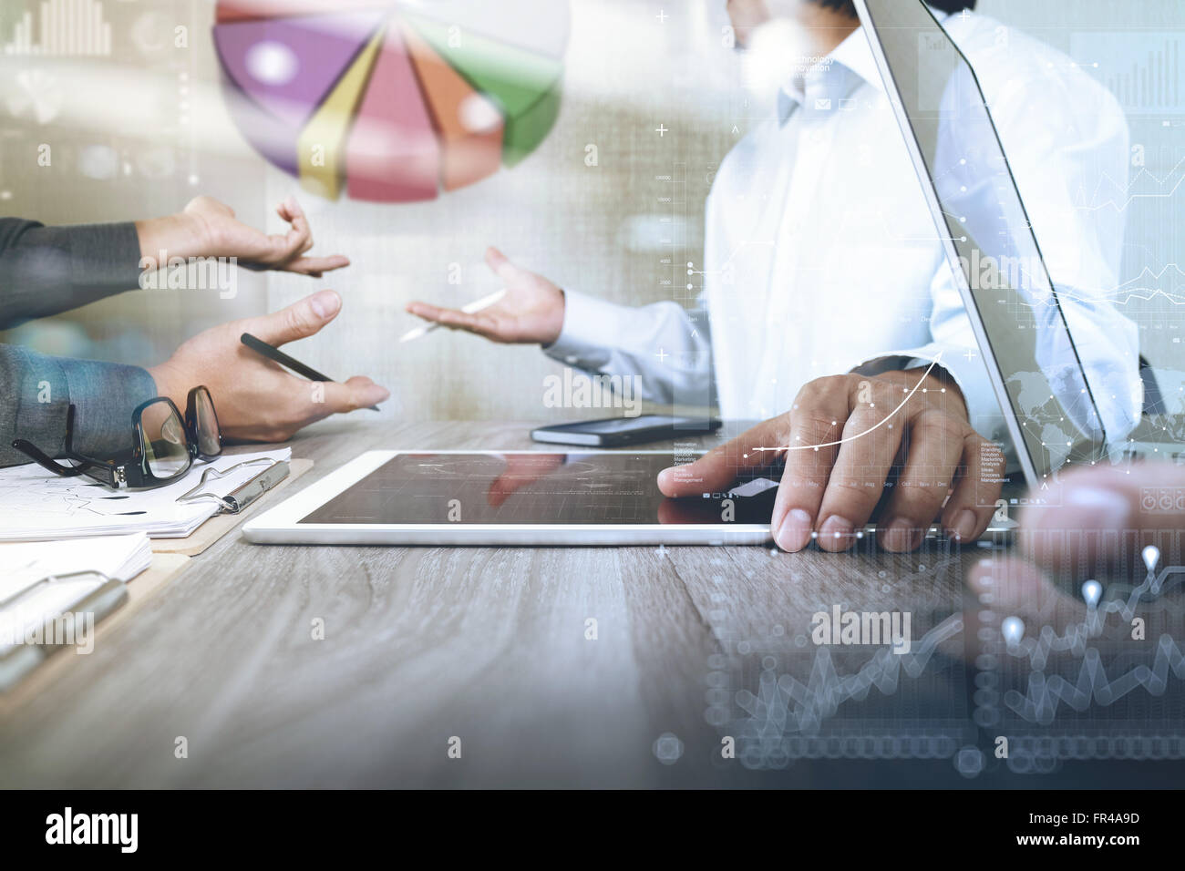 Businessman making presentation with his colleagues and business ...