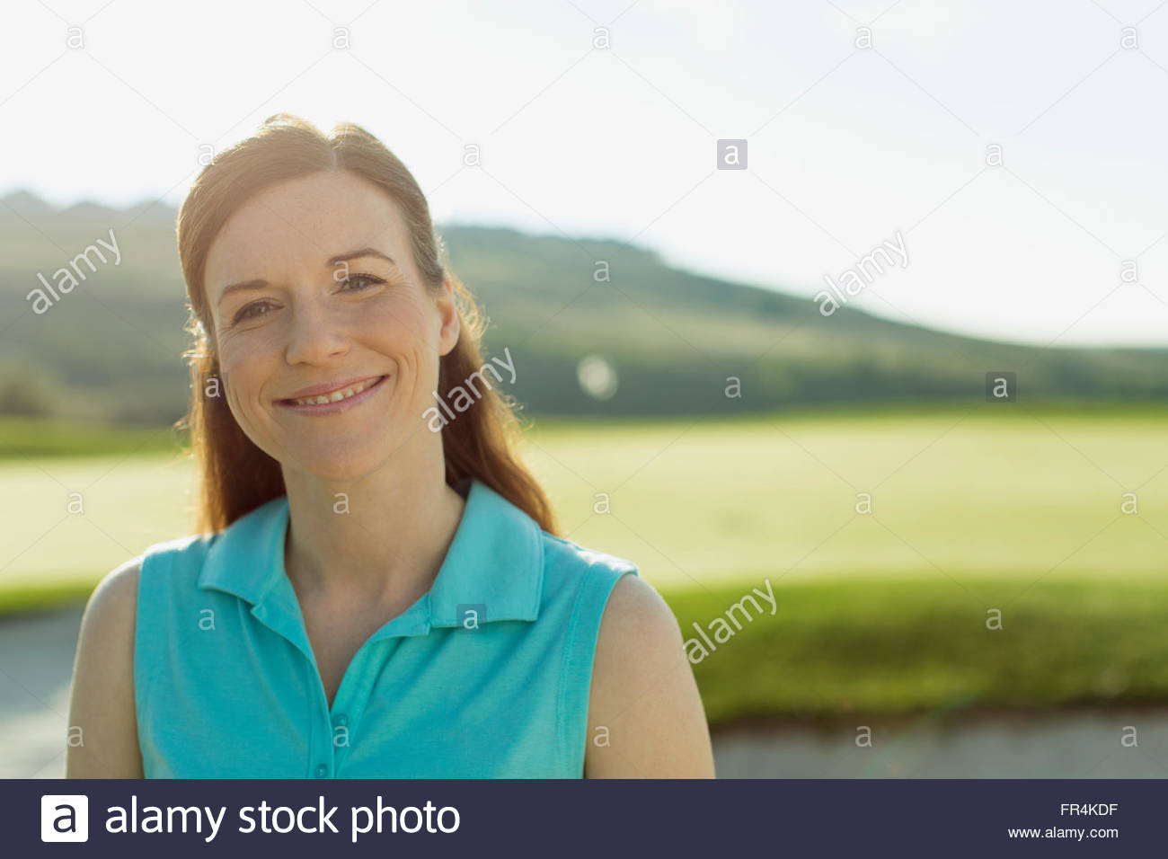 portrait of pretty, midadult female golfer Stock Photo Alamy