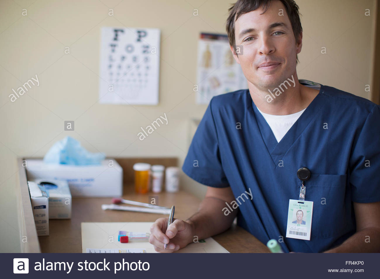 portrait of medical technician in scrubs Stock Photo Alamy