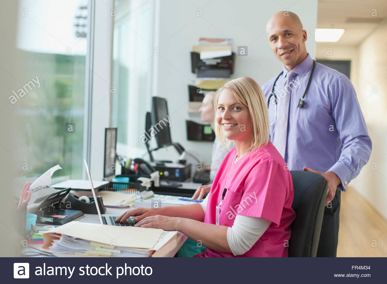 medical professionals working in office Stock Photo Alamy
