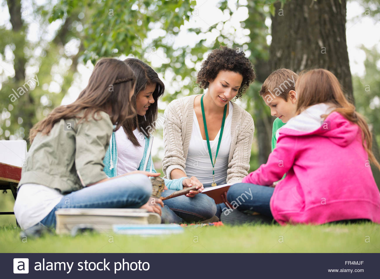 teacher and middle school students on an outdoor trip Stock Photo