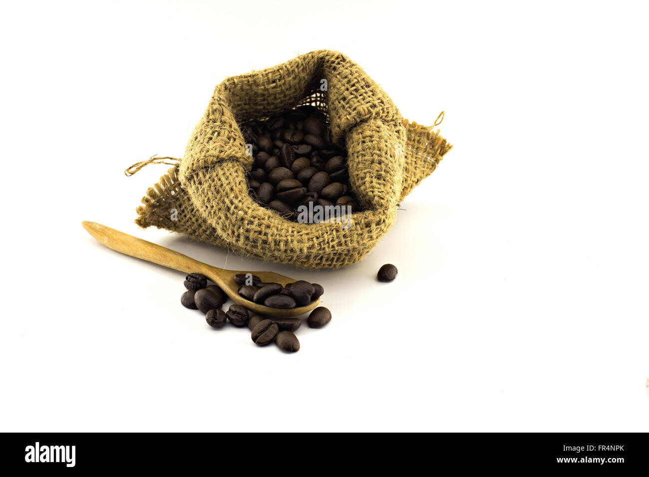 coffee beans in bag isolated on white background Stock Photo - Alamy