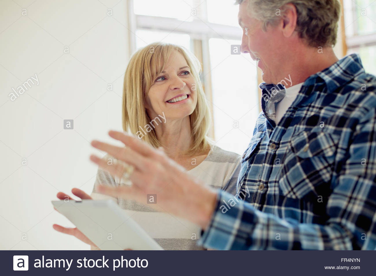 middle aged couple making renovation plans Stock Photo - Alamy