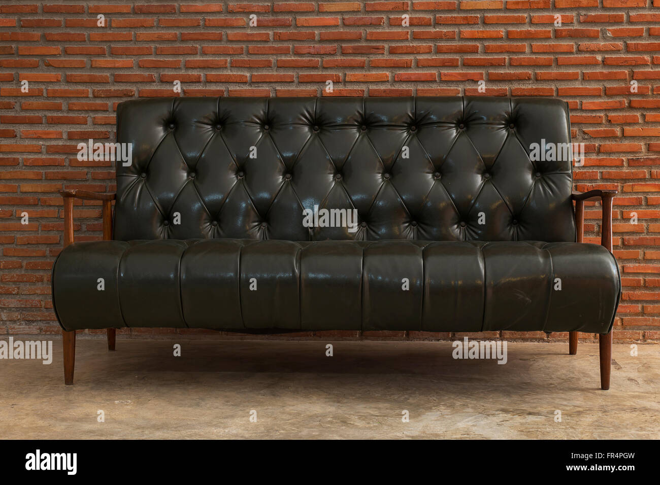 Chair against brick wall hires stock photography and images Alamy