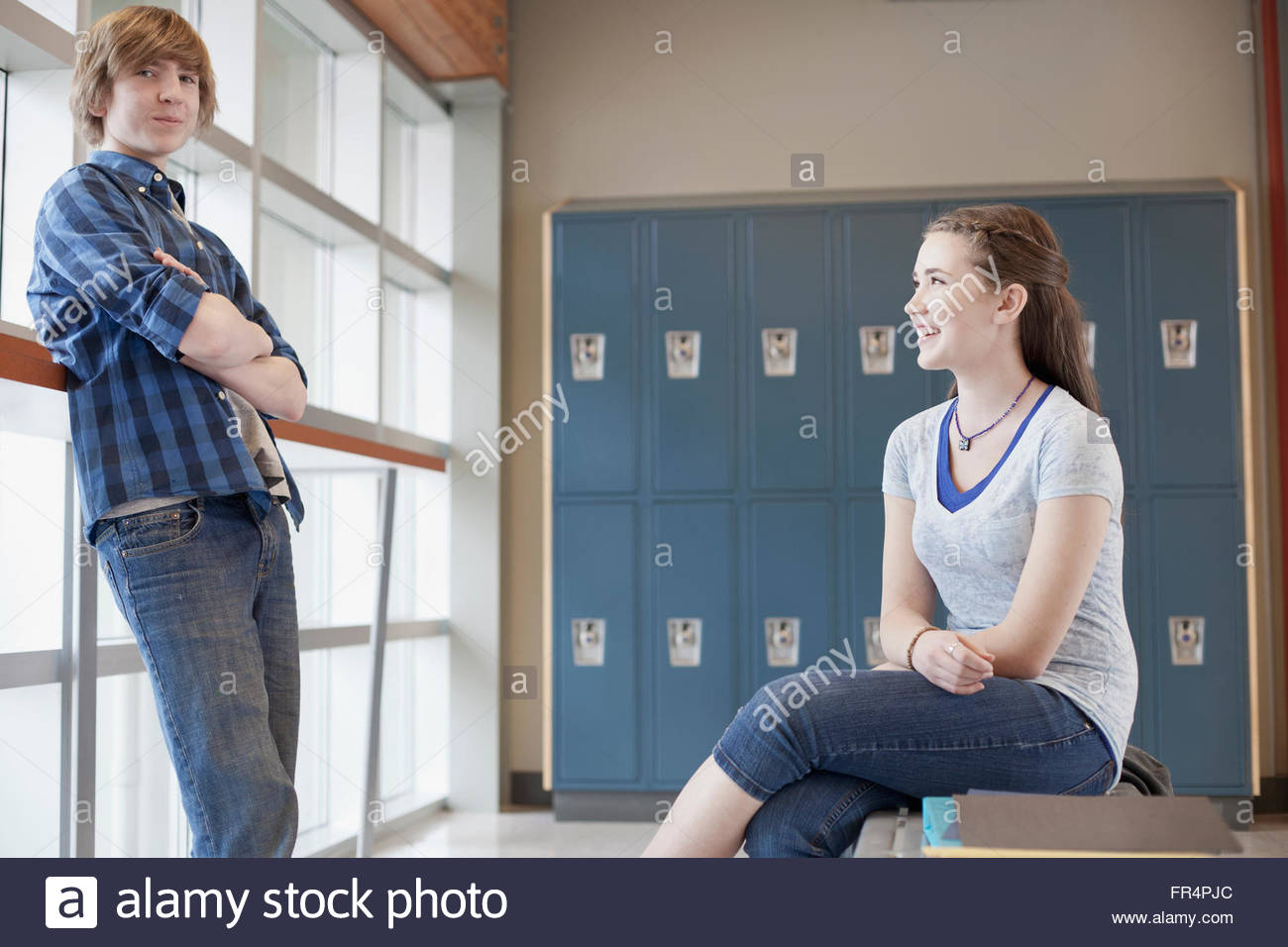 middle school students hanging out at school lockers Stock Photo Alamy