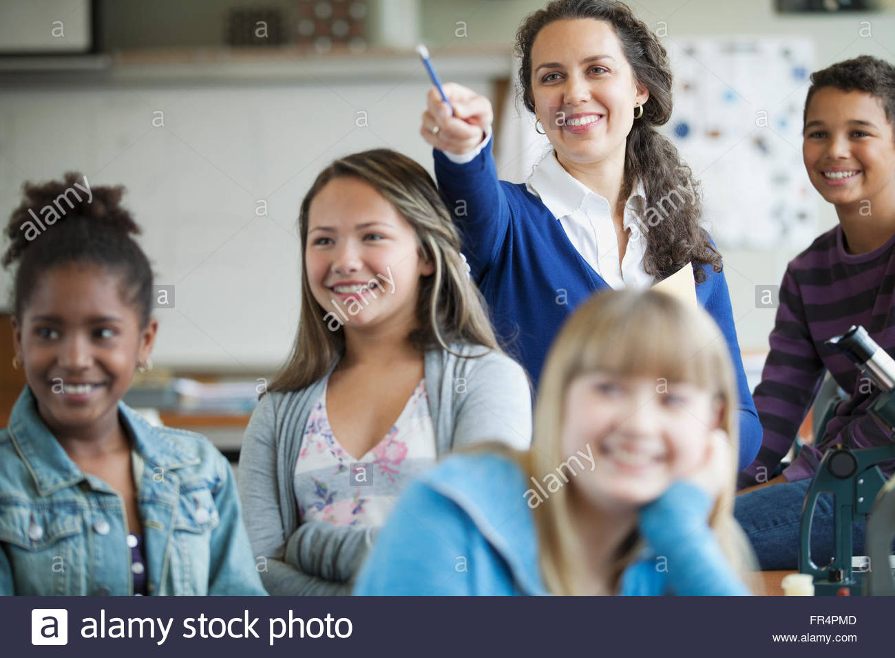 teacher with middle school students Stock Photo