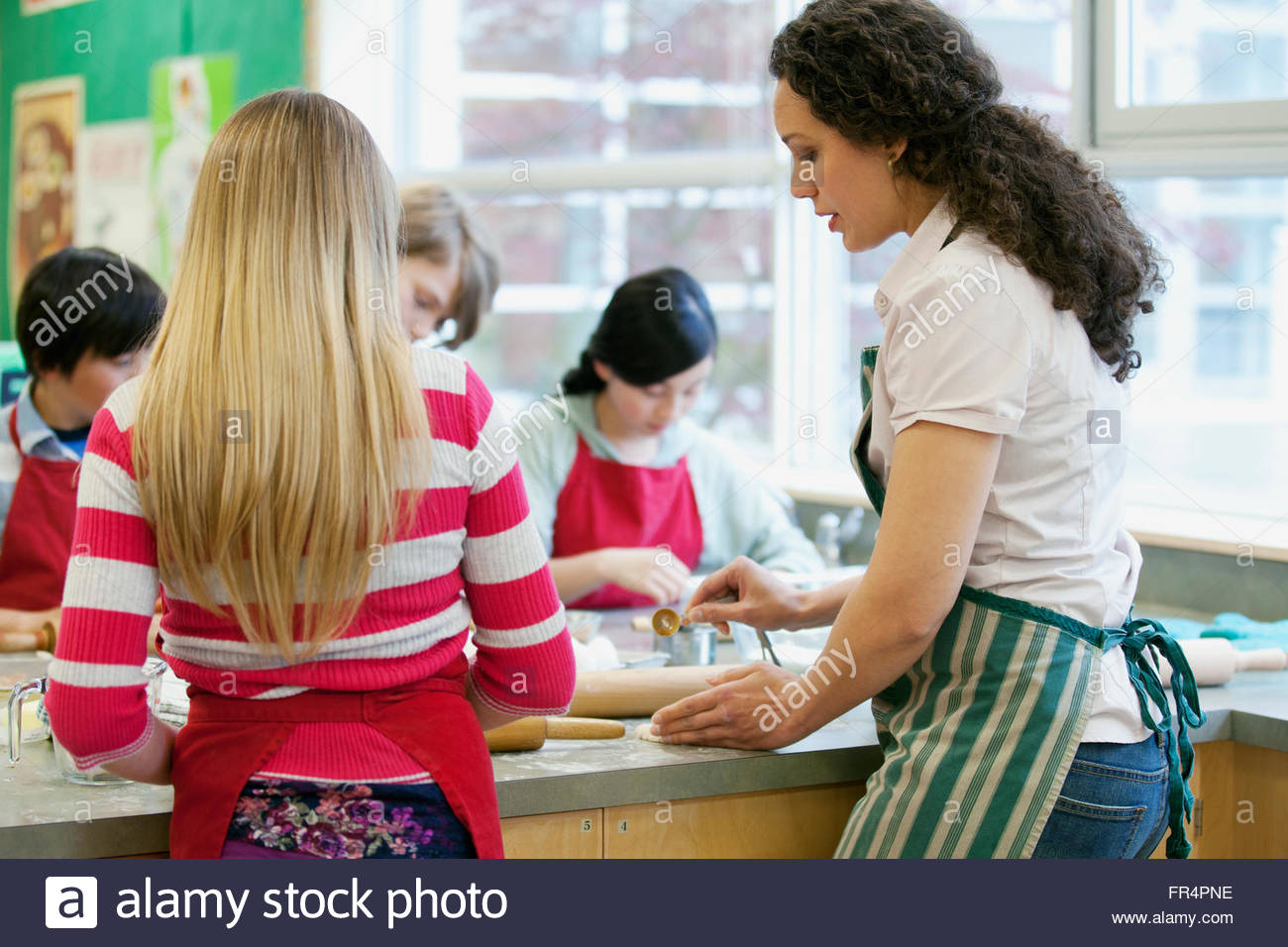 middle school students in cooking class Stock Photo Alamy