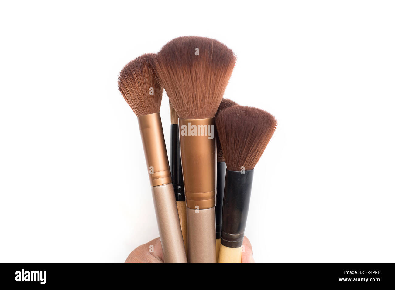 Set of makeup brushes on white background. Stock Photo