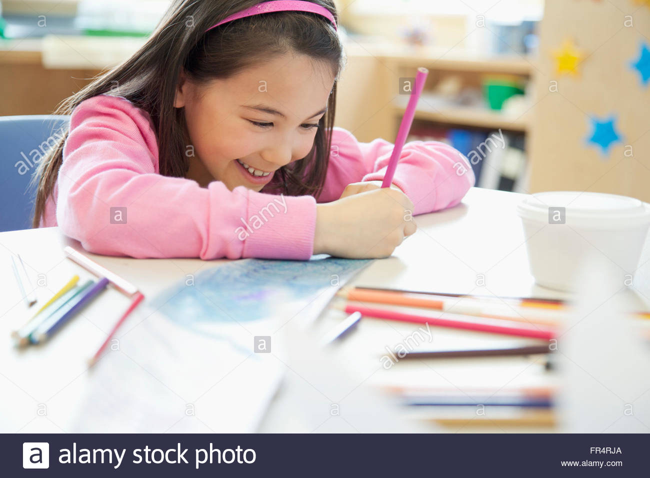 elementary student working on art project Stock Photo