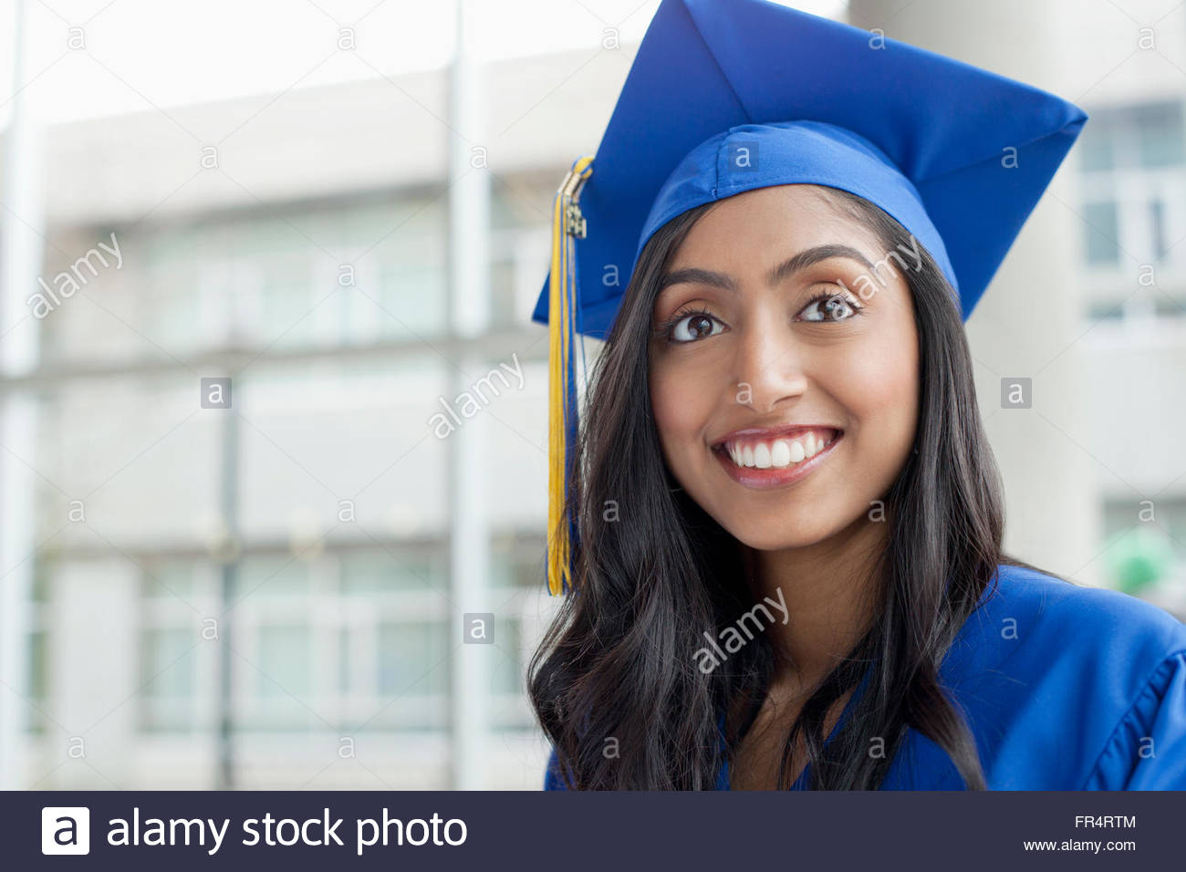 Graduation blue gown hi-res stock photography and images - Alamy